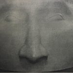 Giant head at the POE Learning Center